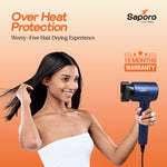 Woman using a Saporo hair dryer with text about over heat protection and warranty on an orange background - 15 month warranty